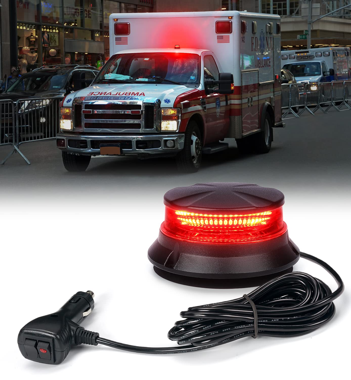 Ambulance with red lights on a city street and a red warning light with power cord in the foreground.